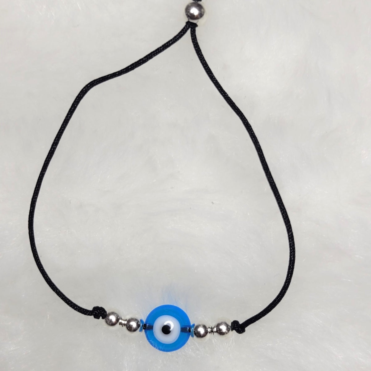 Pulseira regulável bolas prata olho grego