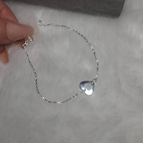 Pulseira cartier entremeio pingente coração vazado